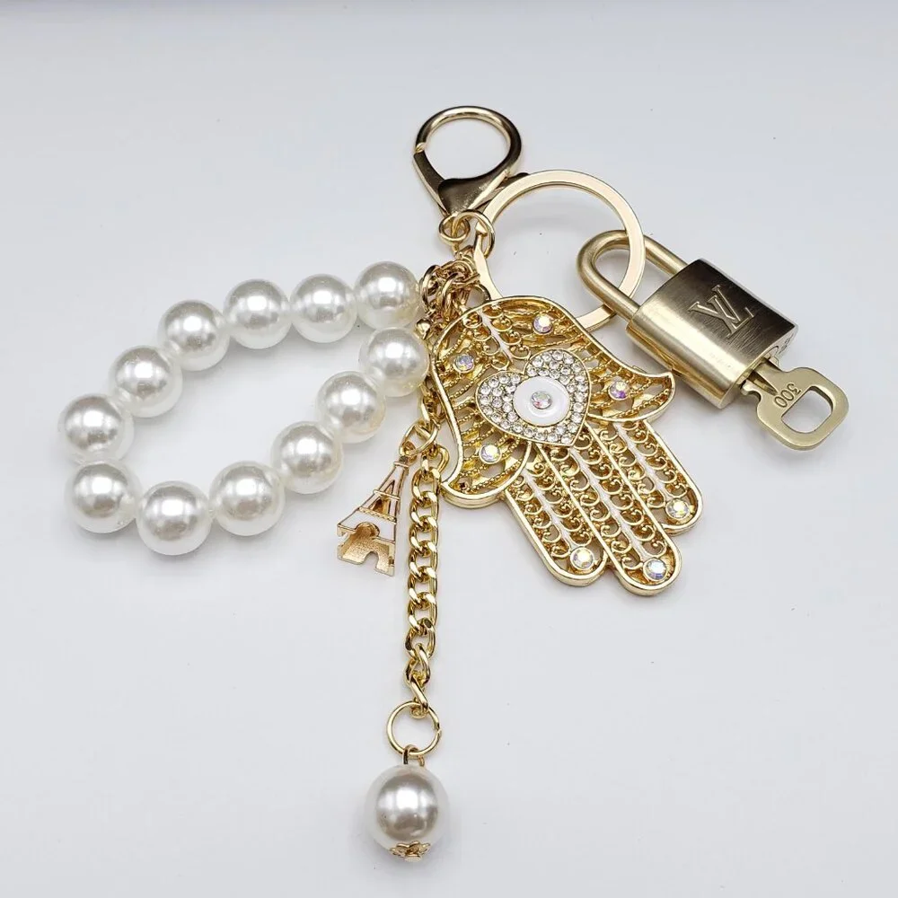 Louis Vuitton Gold Lock 🔒 Authentic LV Key + Unbranded Evil Eye Bag Charm